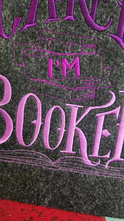 Housse brodée « Can't I'm booked »